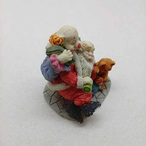 Natal Papai Noel Deitado com Palhaço e Ursinho Resina 7x5cm